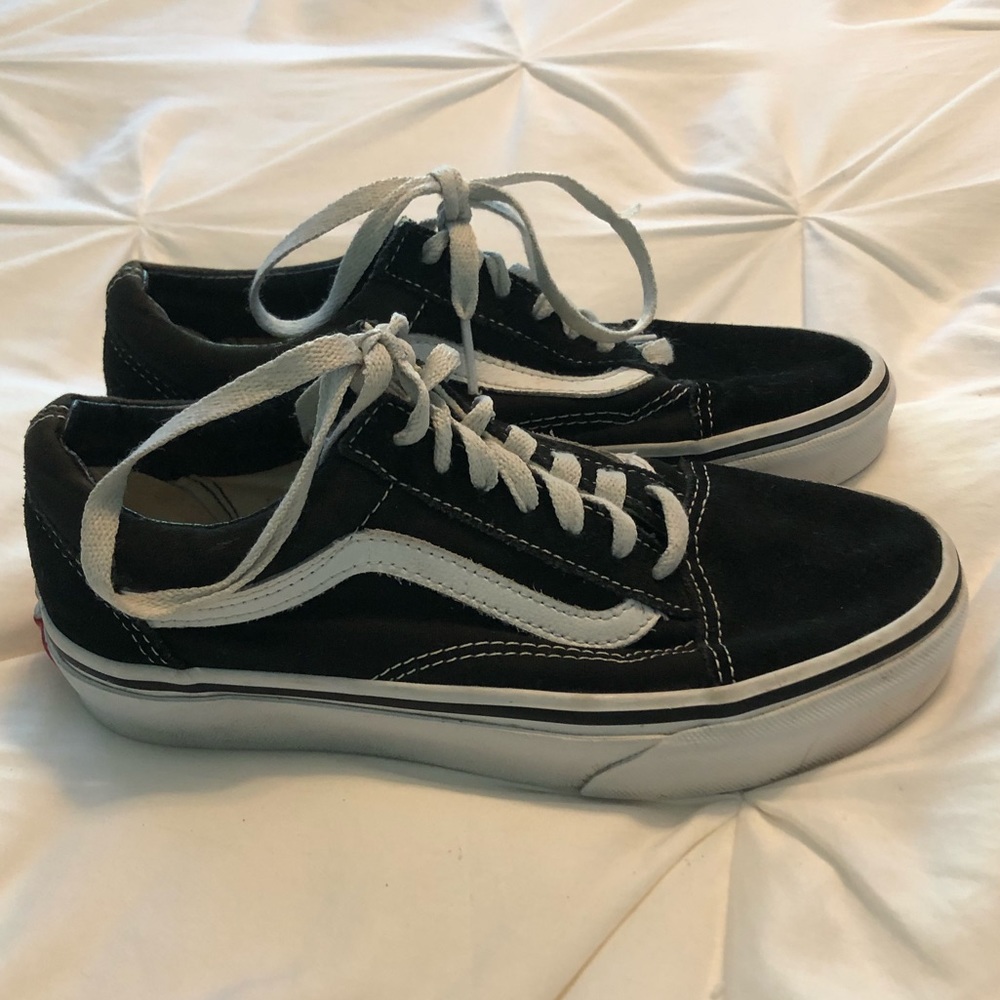 Vans woman’s size 5.5 mens size 4 black sneakers.